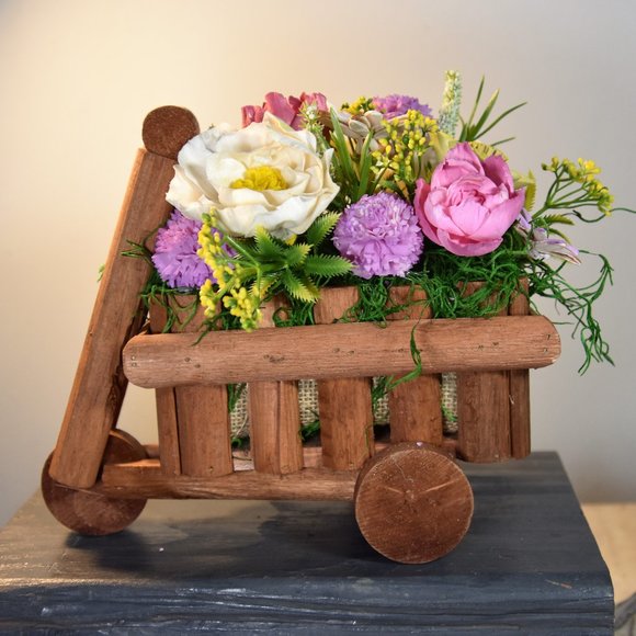 Cheerful garden arrangement of airbrushed Sola wood flowers in a garden cart - Picture 8 of 15